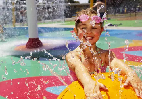 Interactive water attraction and splash pad